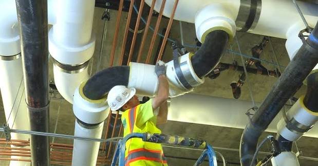 Core drilled penetrations through a slab